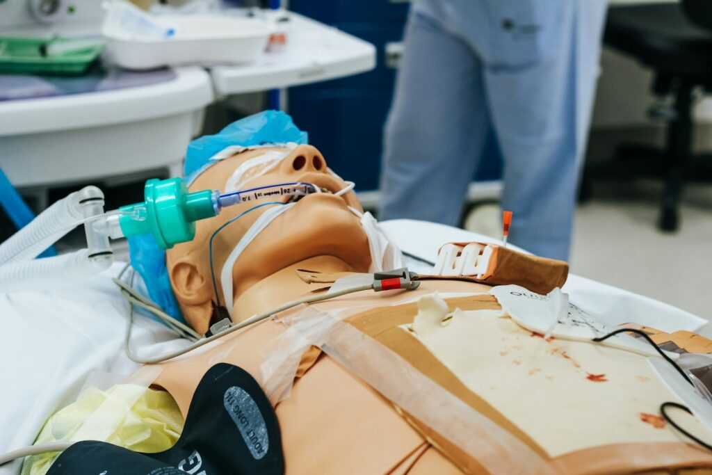 CPR training mannequin used for simulated medical practice, relevant to refreshing life support skills